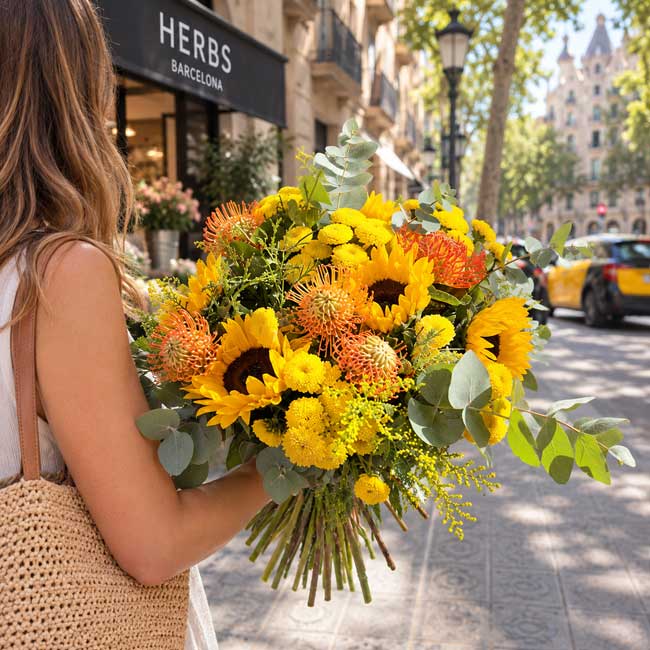 bouquet with sunflowers and proteas